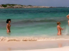 Flawless naked lasses take a dip in the ocean