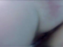 Naked women underwater at a nudist resort pool