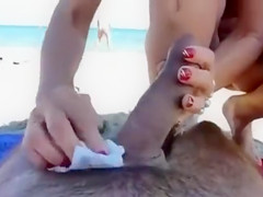 Dick and ball sucking wife at a public beach