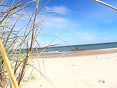 Pussy play and skinny-dipping on public beach