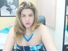 Latina showing off her boobs and pussy