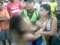 Jealous chicks fighting with their boobs out