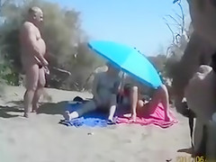 Masturbation party on the sunny beach