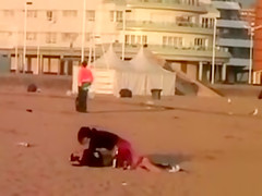 Rubbing the pussy on boyfriend's cock on the public beach