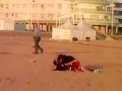 Rubbing the pussy on boyfriend's cock on the public beach