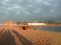 Rubbing the pussy on boyfriend's cock on the public beach