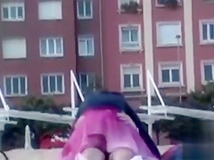 Rubbing the pussy on boyfriend's cock on the public beach