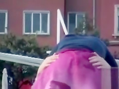 Rubbing the pussy on boyfriend's cock on the public beach