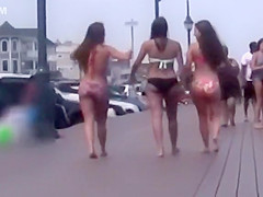 Three cuties with big asses on the boardwalk