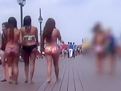 Three cuties with big asses on the boardwalk