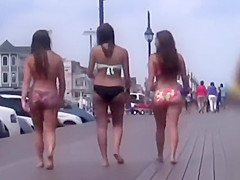 Three cuties with big asses on the boardwalk