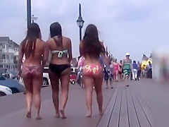 Three cuties with big asses on the boardwalk