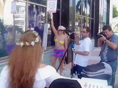 Topless protest on the Miami beach of Florida