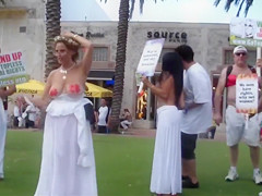 Topless protest on the Miami beach of Florida