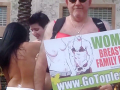 Topless protest on the Miami beach of Florida