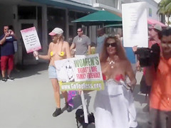 Topless protest on the Miami beach of Florida