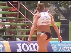 Beach volleyball girls with athletic asses in bikini bottoms
