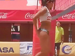 Beach volleyball girls with athletic asses in bikini bottoms