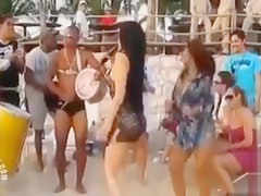 Hot Latina chicks dancing at a beach party