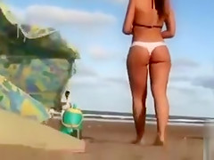Bubble butt Brazilian chick in a sexy bikini at the beach