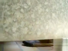 Spying on a couple screwing in the bathroom