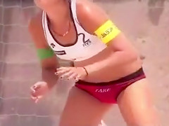 Cute beach volleyball players with great bodies
