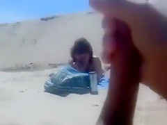 Masturbating to a stranger on the beach