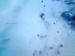 German chick jerks her new friend off at the beach