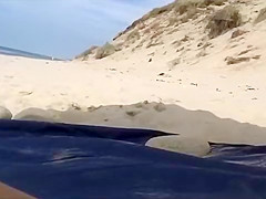 Older man jerks his dick on the beach