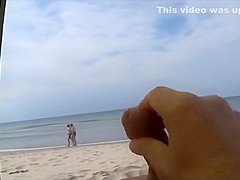 Older man jerks his dick on the beach