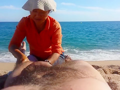 Older Asian bitch massages a guy's hairy legs admiring his big cock