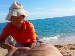 Older Asian bitch massages a guy's hairy legs admiring his big cock