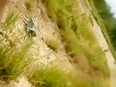 Stroking as ladies hang out on the beach