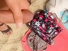 Stroking as ladies hang out on the beach