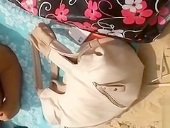 Stroking as ladies hang out on the beach