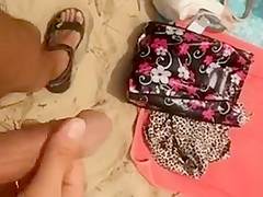 Stroking as ladies hang out on the beach