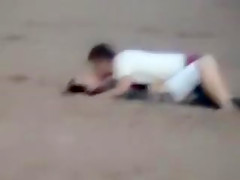 German couple makes love on the deserted beach