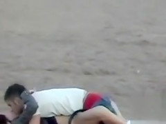 German couple makes love on the deserted beach