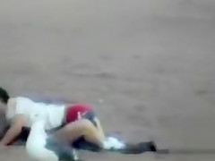 German couple makes love on the deserted beach