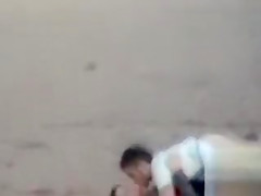 German couple makes love on the deserted beach