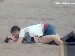 German couple makes love on the deserted beach