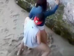 Hot young brunette fucked at the beach