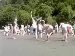 Naked performance art on the beach