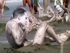 Naked performance art on the beach