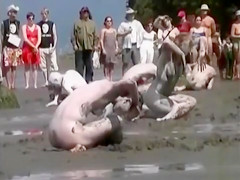 Naked performance art on the beach