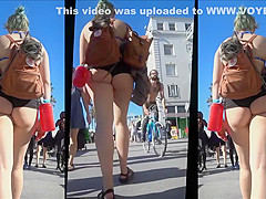 Sweet babe has most of her butt revealed on tape