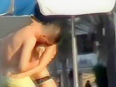 Italian girl fingered hard on the public beach