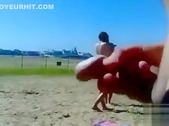 German pervert jerks off to women on topless beach