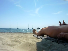 Real exhibitionist strokes his horny dick on a public beach