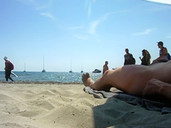 Real exhibitionist strokes his horny dick on a public beach